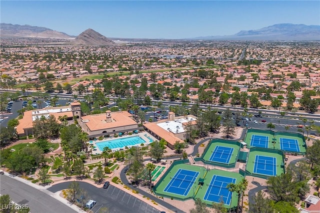 birds eye view of property with a residential view and a mountain view