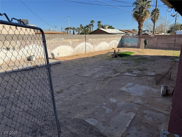 view of yard featuring a fenced backyard