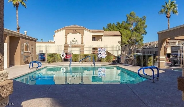 pool featuring fence