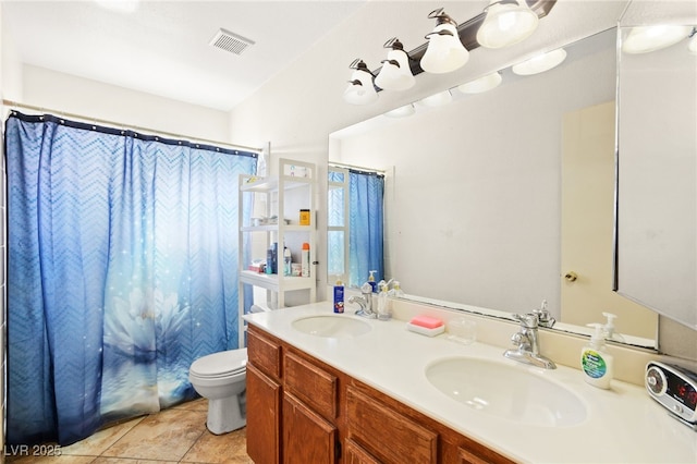 full bathroom with double vanity, visible vents, toilet, and a sink