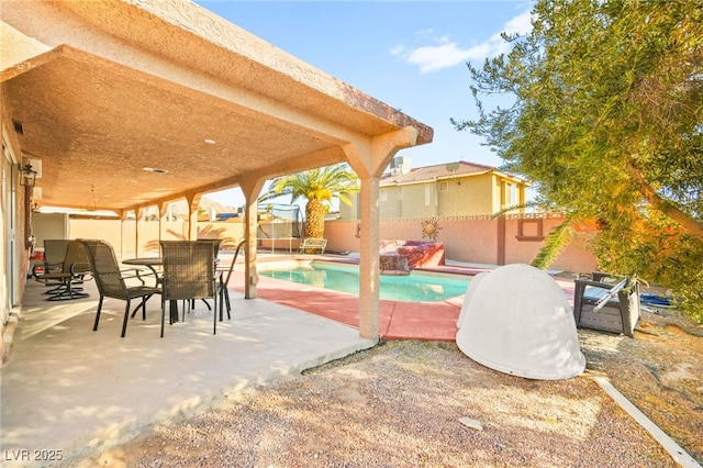 view of swimming pool with a patio area, a fenced in pool, and a fenced backyard