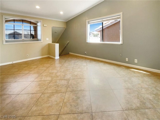 tiled empty room with vaulted ceiling, recessed lighting, baseboards, and ornamental molding