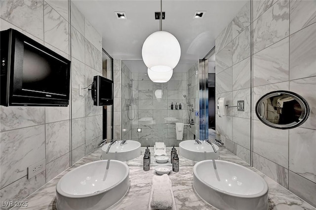 full bathroom with visible vents, a bidet, tile walls, and a stall shower