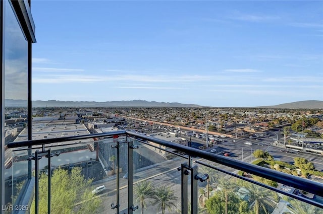 balcony featuring a mountain view