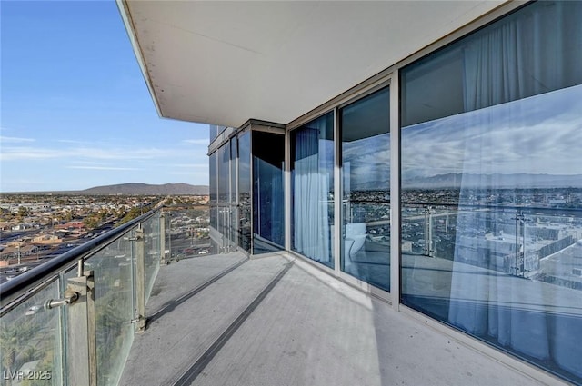 balcony featuring a mountain view