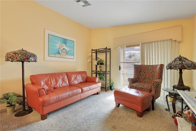 living room with visible vents and carpet floors