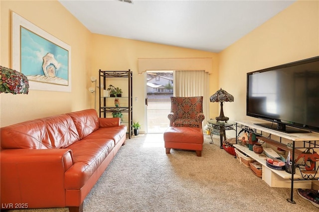 living room with carpet and lofted ceiling