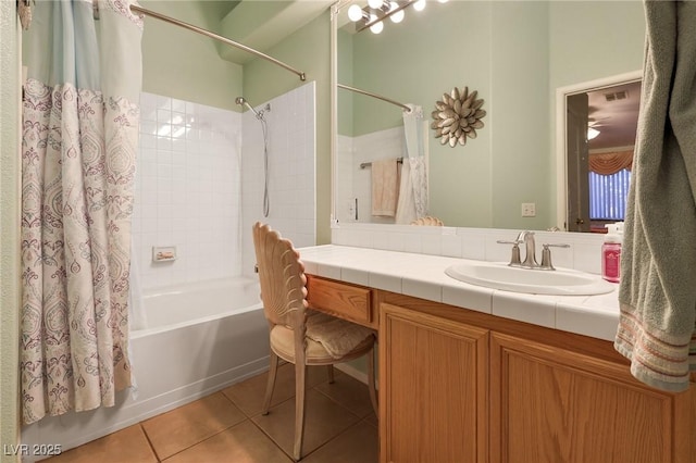 bathroom featuring vanity, tile patterned floors, visible vents, and shower / bath combo