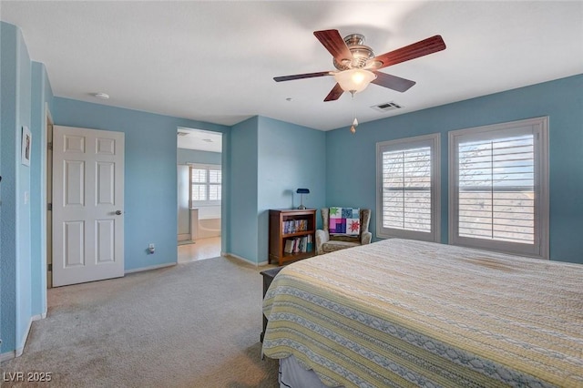 bedroom featuring visible vents, carpet floors, baseboards, and a ceiling fan