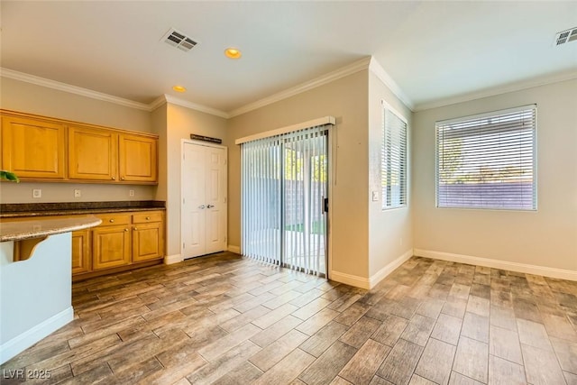 kitchen featuring light wood-style floors and baseboards