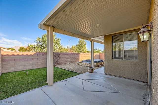 view of patio with a fenced backyard