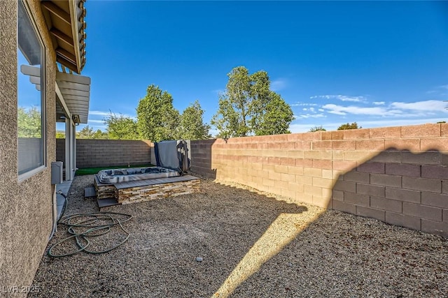 view of yard with a patio and a fenced backyard