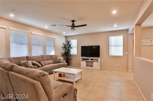 living room featuring light tile patterned floors, visible vents, recessed lighting, and a ceiling fan