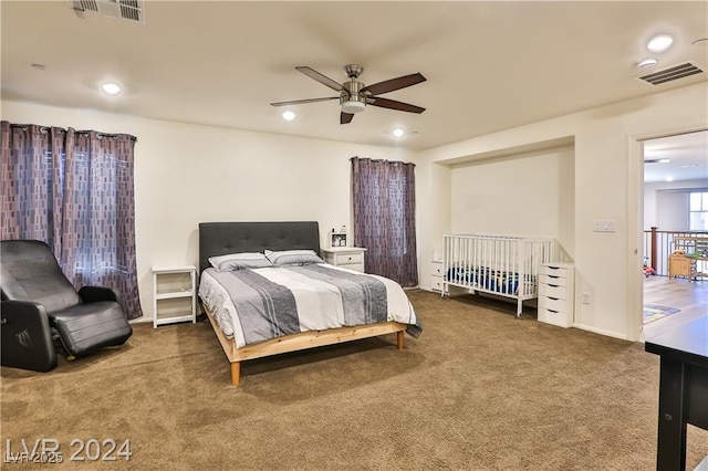 bedroom featuring recessed lighting, visible vents, and carpet