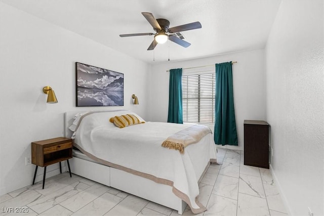 bedroom with baseboards, marble finish floor, and ceiling fan