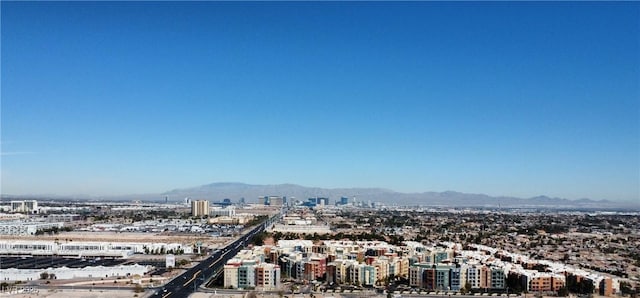 property view of mountains featuring a view of city