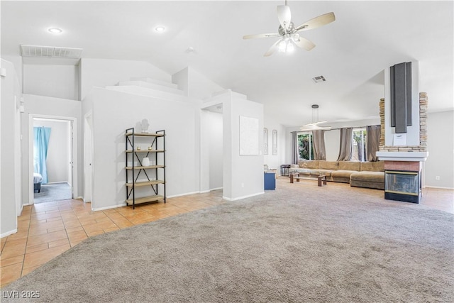 124 Beach Oak Ave, Henderson, NV 89002 - unfurnished living room featuring a ceiling fan, visible vents, tile patterned flooring, and carpet