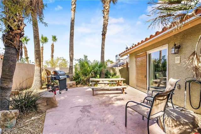 124 Beach Oak Ave, Henderson, NV 89002 - view of patio featuring fence and a grill