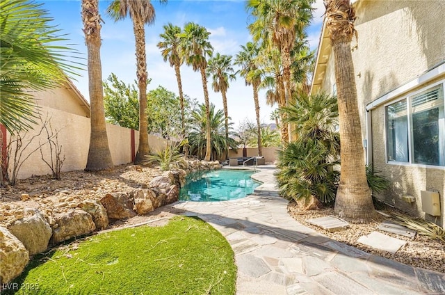 124 Beach Oak Ave, Henderson, NV 89002 - view of swimming pool featuring a fenced backyard, a fenced in pool, and a patio