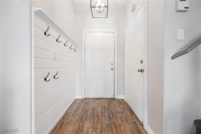 doorway featuring dark wood-style flooring