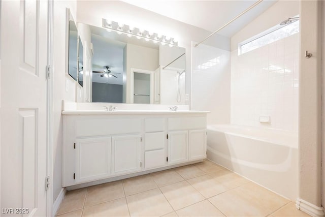 bathroom featuring tile patterned floors, shower / bathing tub combination, ceiling fan, and double vanity