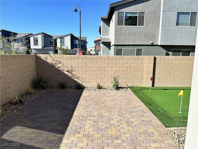 view of patio featuring a fenced backyard