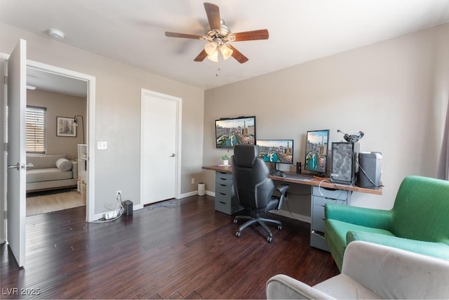 office space featuring ceiling fan, baseboards, and wood finished floors