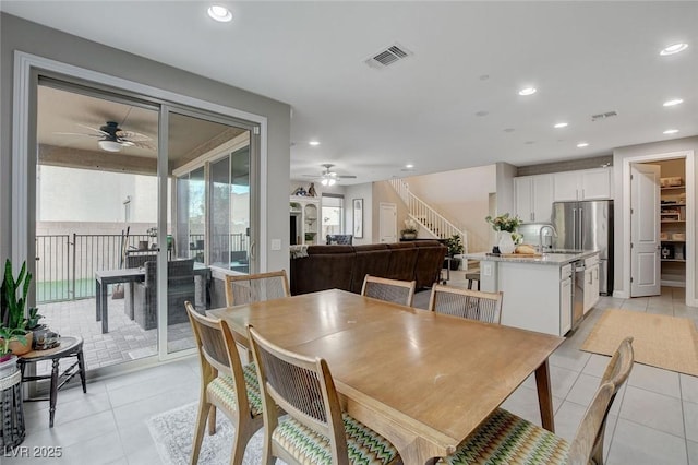 dining area with light tile patterned flooring, recessed lighting, and visible vents