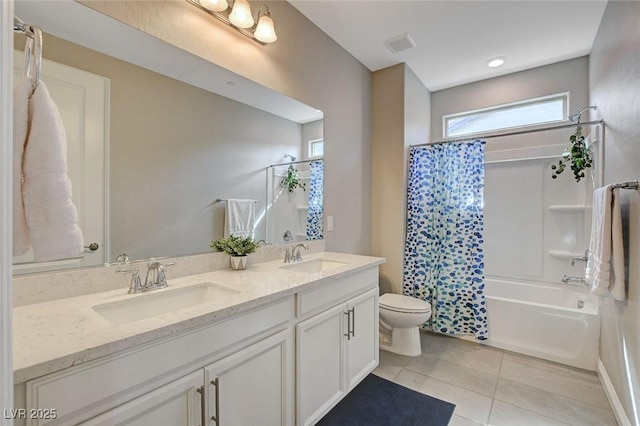 full bathroom with a sink, visible vents, toilet, and tile patterned flooring