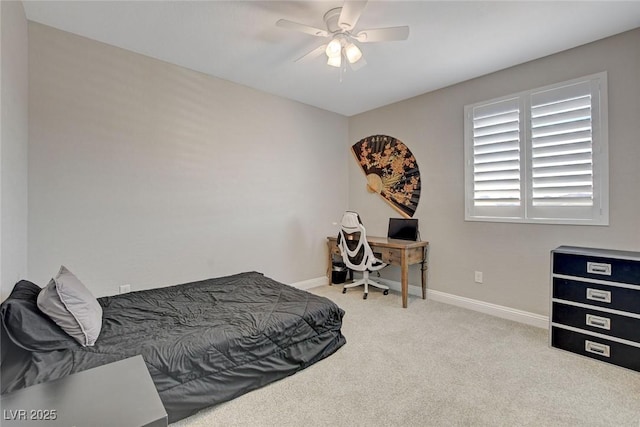 bedroom featuring ceiling fan, baseboards, and carpet