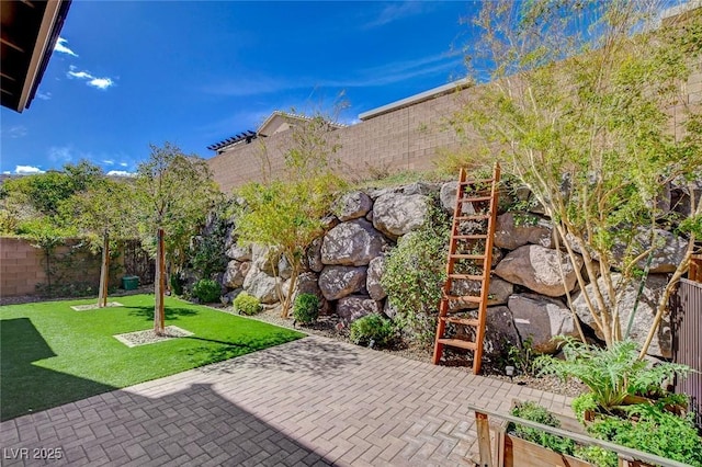 view of patio featuring a fenced backyard