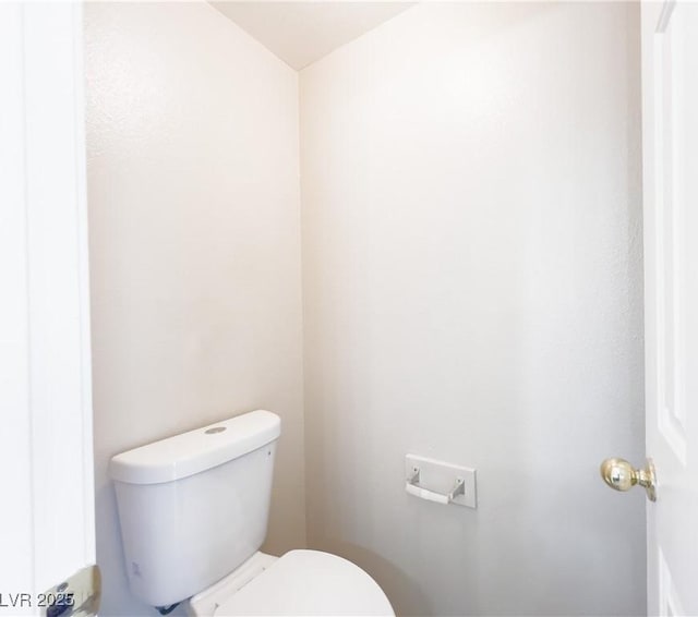 bathroom featuring toilet