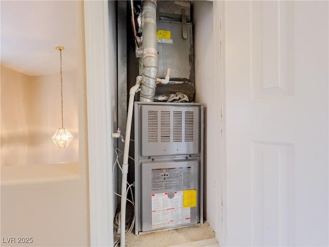 utility room with heating unit