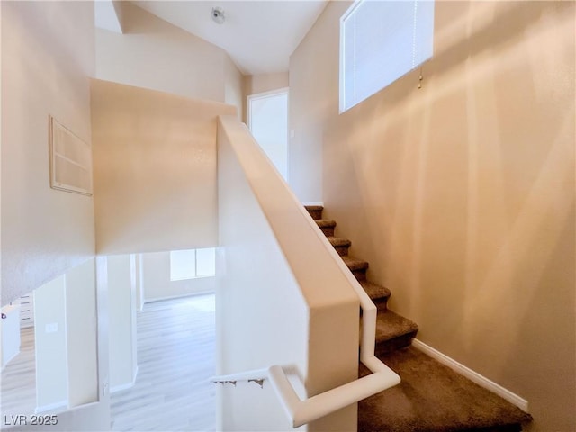 stairway with baseboards