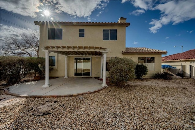 back of property with a patio, fence, a pergola, stucco siding, and a tile roof