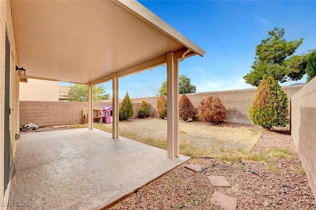 view of patio with a fenced backyard