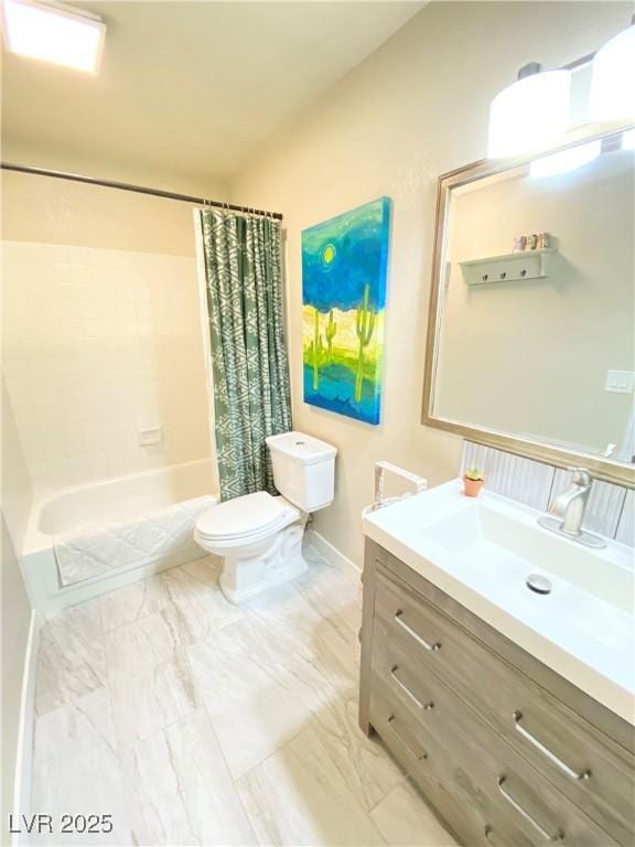 bathroom with vanity, shower / bath combination with curtain, toilet, and baseboards