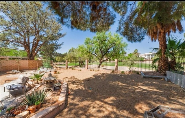 view of yard featuring fence