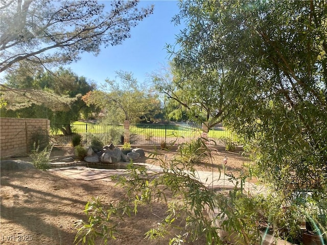 view of yard with fence