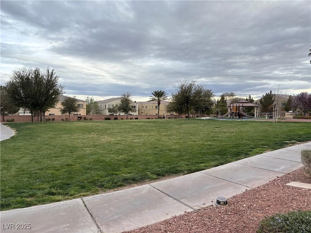 view of yard featuring playground community