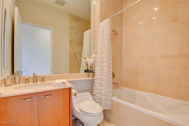 full bathroom featuring shower / bathtub combination with curtain, toilet, and vanity