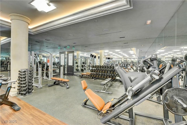 workout area with decorative columns
