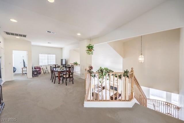 dining area featuring recessed lighting, visible vents, and carpet flooring