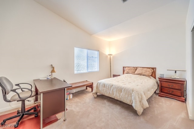 bedroom featuring vaulted ceiling, carpet flooring, and baseboards