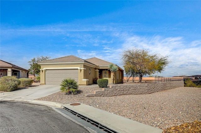 ranch-style house with stucco siding, driveway, an attached garage, and fence