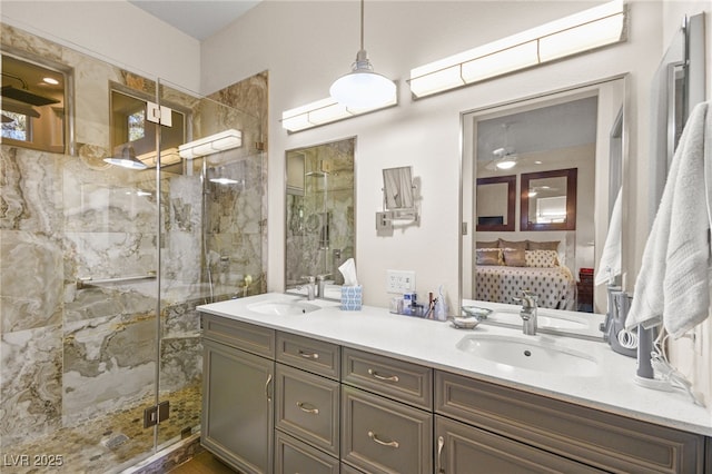 full bathroom with a sink, a stall shower, ensuite bath, and double vanity