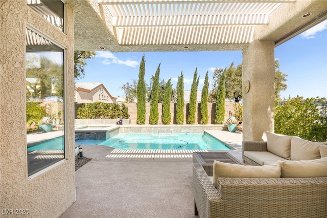 view of pool with an outdoor living space, a patio, a pool with connected hot tub, and a fenced backyard