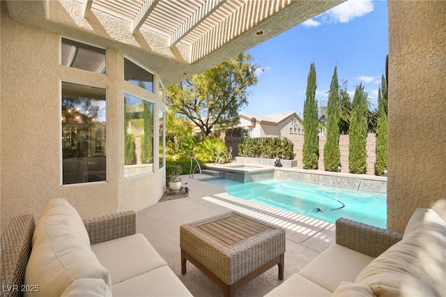 view of pool featuring a patio area, an outdoor hangout area, a pool with connected hot tub, and a fenced backyard