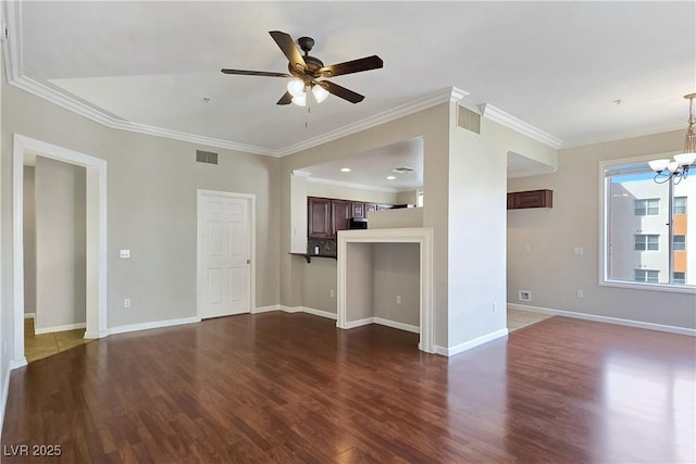 unfurnished living room with dark wood-style floors, visible vents, and baseboards