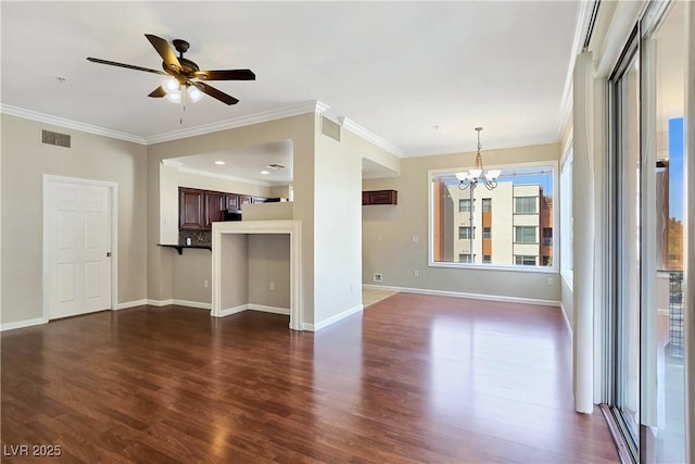 unfurnished living room featuring baseboards, visible vents, dark wood-style flooring, crown molding, and ceiling fan with notable chandelier